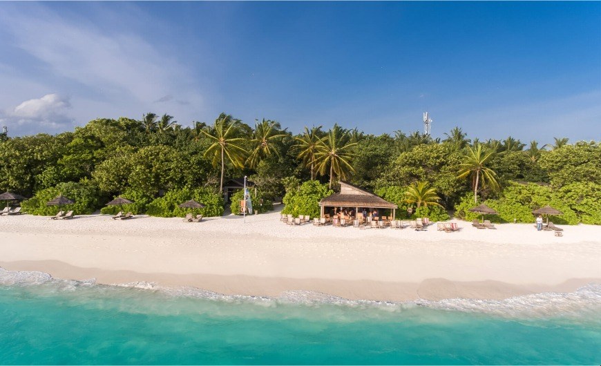 A view of Maldives beach with Reethi Beach Resort island