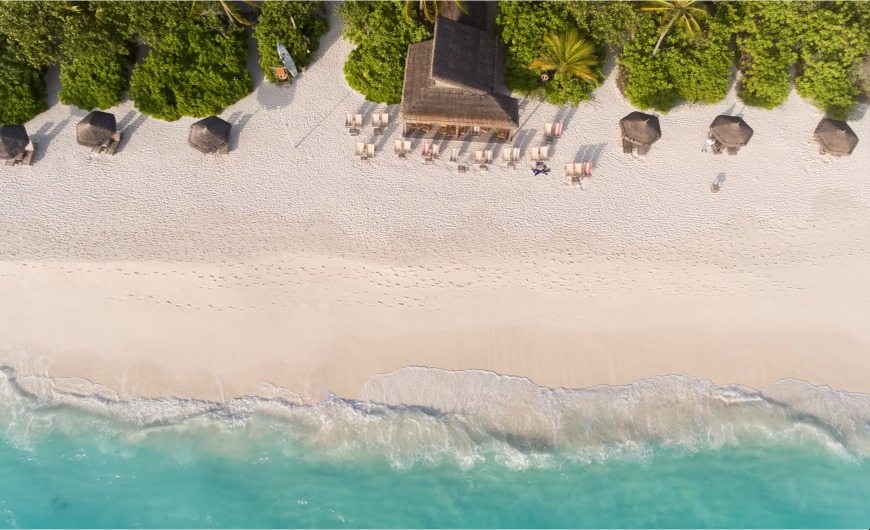 Top view of white sand beach with Maldives Island