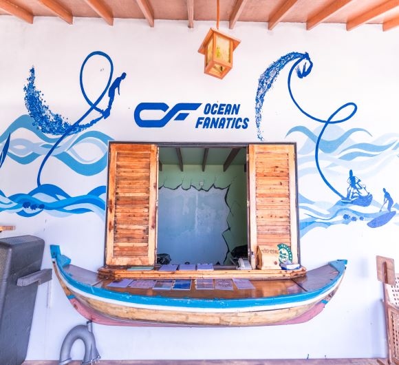 Closeup of services counter for ocean fanatics water sports at Reethi Resort Maldives